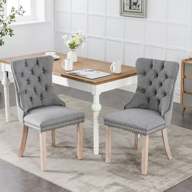 Lot de 2 chaises de salle à manger tapissées en lin ou velours avec bordure cloutée et pieds en bois