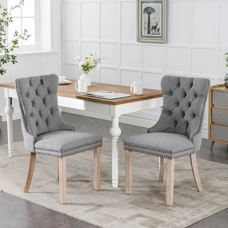 Lot de 2 chaises de salle à manger tapissées en lin ou velours avec bordure cloutée et pieds en bois