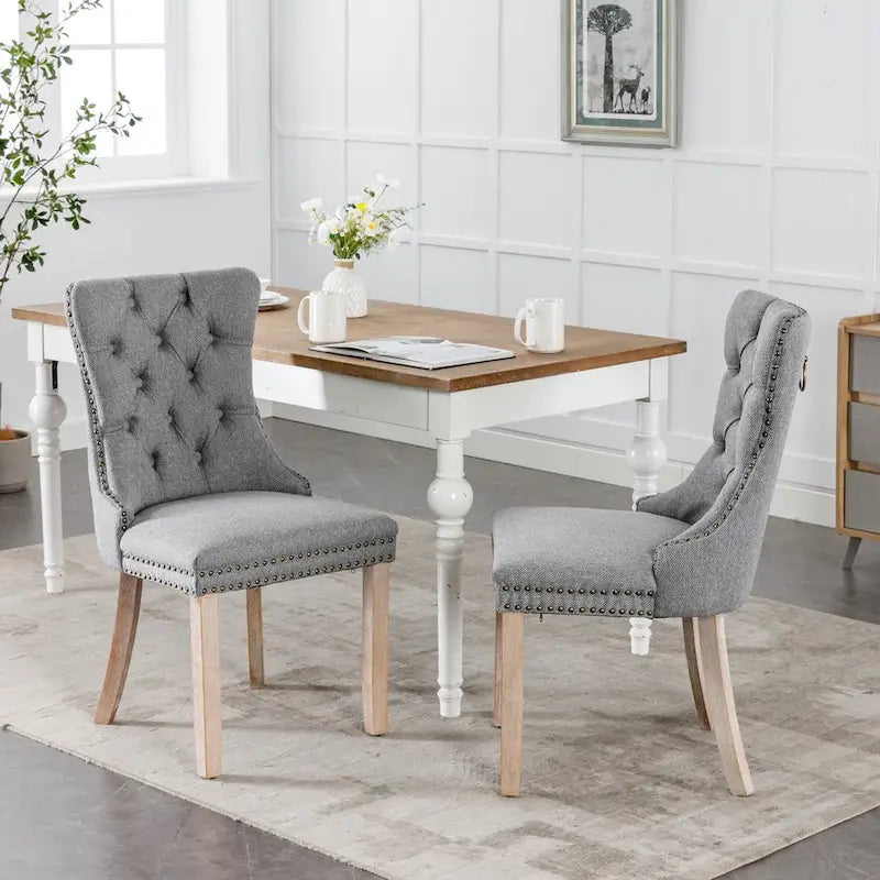 Lot de 2 chaises de salle à manger tapissées en lin ou velours avec bordure cloutée et pieds en bois
