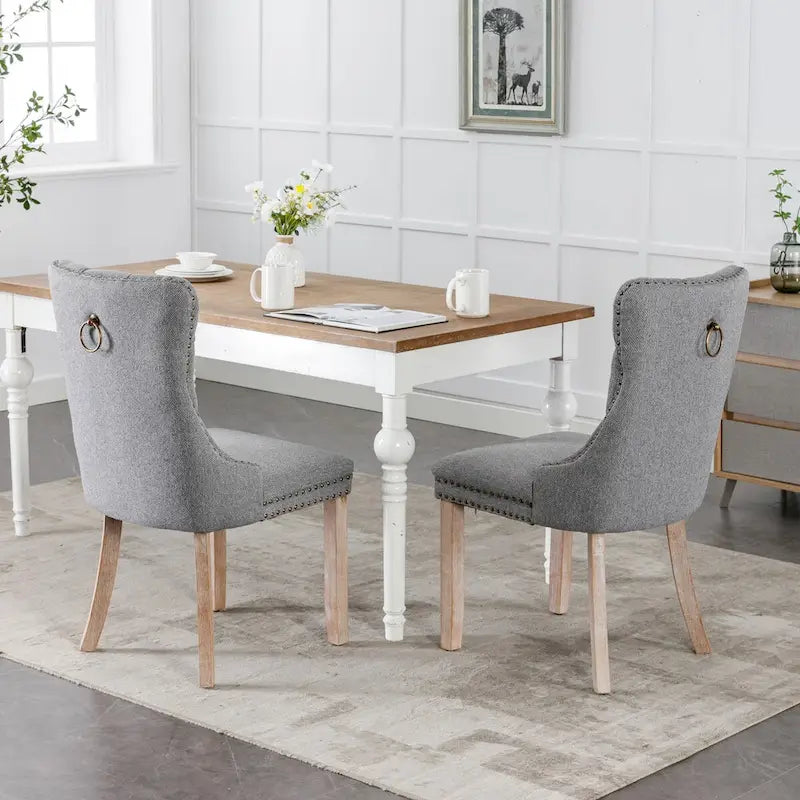 Lot de 2 chaises de salle à manger tapissées en lin ou velours avec bordure cloutée et pieds en bois